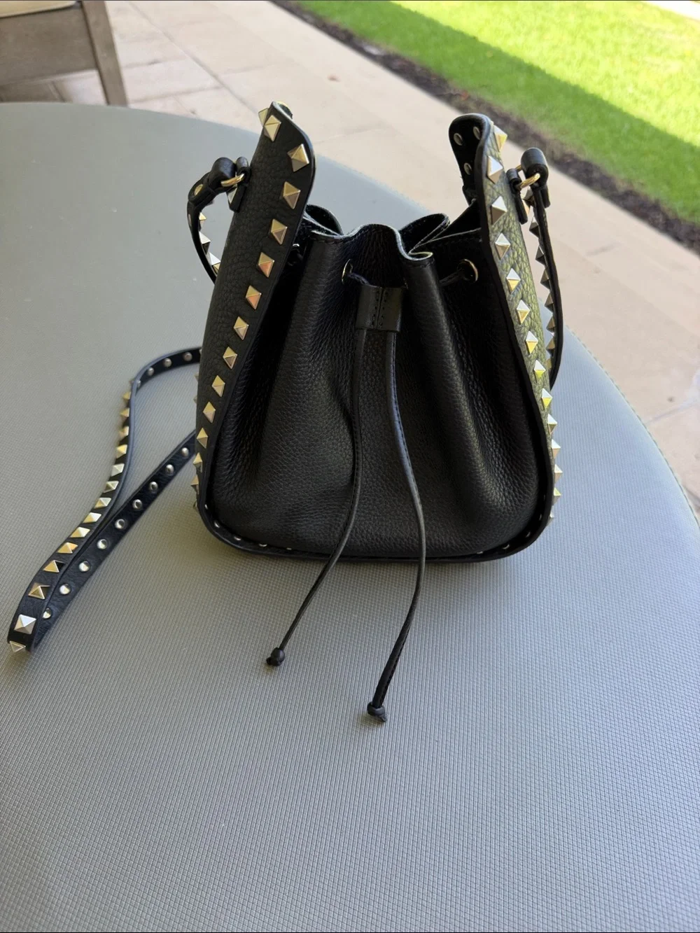 Valentino Garavani Black Leather Rockstud Drawstring Crossbody - Picture 2 of 8